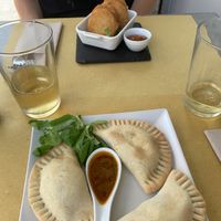 Empanadas (onions and potatoes) and nuggets with potatoes and vegan cheese   at Organic Lovers Torino in Turin