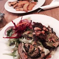 The Vegan Toast under This & That on the menu - wasabi sauce and beetroot chutney with cashews. And that's the veggie burger in the background. at The Laundromat Cafe in Reykjavik