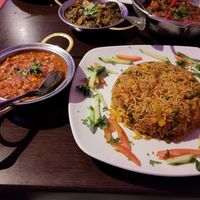 Vegetable biryani, with sag aloo balti and sag bhajee behind at Refa Tandoori in Melksham