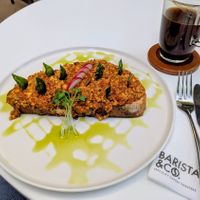 Spicy tofu scramble on sourdough at Barista & Co - Sarit Centre in Nairobi