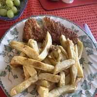 Vegan fish and chips (there was double this amount of chips in the portion - this was as much as I could have on the plate). Really really tasty   at Elland Fish & Chips in Elland