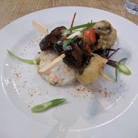 Japanese Style Kebabs [£5.20] (Vegan) – Aubergine, button mushroom, courgette baked in a Japanese style BBQ sauce, skewered with battered Tofu Vish & Cherry Tomato on chirashi r at Sky Apple Cafe in Newcastle Upon Tyne
