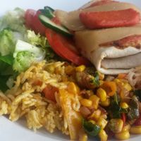 Hummus burrito with side salad  at Sky Apple Cafe in Newcastle Upon Tyne
