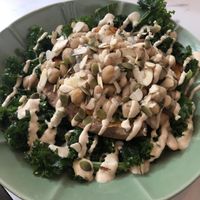 loaded sweet potato over kale  at La Isla in San Juan