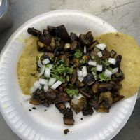 Finished white mushroom tacos with onion and cilantro   at hippiestacos in Long Beach