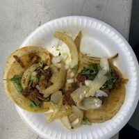 Jackfruit taco with grilled onions, chopped onions, and cilantro   at hippiestacos in Long Beach