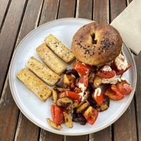Sourdough bagel w/ Tomato + mushroom + vegan cream cheese. Soooo good!!!  at Lazy Bird in Koh Lanta