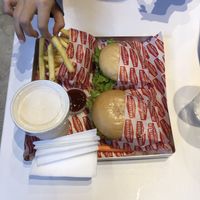 Two double smash burgers and fries with peanut milkshake   at Rightside Fast Food - Mont Kiara in Kuala Lumpur