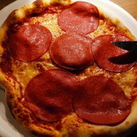 Vegan salami pizza at Vapiano in Graz