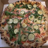 Pizza verde made with vegan cheese and pesto at Cantuccio in Tunbridge Wells