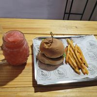 Black bean burger, fries, and strawberry smoothie at The Community Kitchen in Panama City