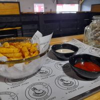 Regular fries with tahini & ketchup at The Community Kitchen in Panama City