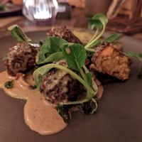 Carrot steaks in sesame sauce at Torfhús Retreat in Selfoss