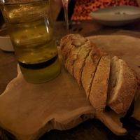 Freshly baked bread with olive oil at Torfhús Retreat in Selfoss