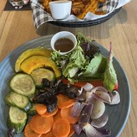 Grilled veggie salad and waffle fries  at The Coffee Club - Beach Point Phuket in Phuket