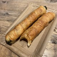 Spinach burek and half eaten potato burek   at Backstube Tromsoe in Tromsoe