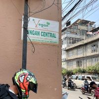 Side sign  at The White Lotus Cafe - Gairidhara in Kathmandu