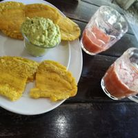 Guacamole and patacones, mixed fruit smoothie at Soda Pura Vida in Santa Teresa