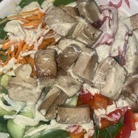 Create your own bowl (spinach, carrots, pickled onion, cucumber, and tofu topped with the vegan caeser dressing)  at Elixir in Reno