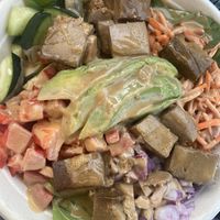 DIY Bowl: Spinach, Quinoa, Tofu, Avocado, Carrot, Onion, Cucumber, Bell Pepper, and Spicy Peanut Vinaigrette.   at Elixir in Reno