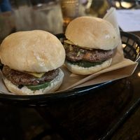 LIL BIG MUFF
A muffelatta inspired slider, impossible, olive spread, roasted red pepper, smoked "provelone", remoulade, on lil burger buns  at La Setima Club in Tampa