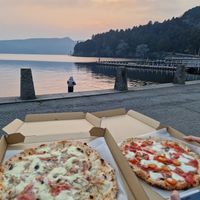 The pizza on the right side was the margherita pizza with buffalo mozzarella  (vegetarian, not vegan). Was very good! at La Terrazza in Hakone
