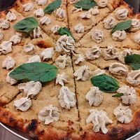 Punk Rock Girl w/extra Cashew Ricotta

Roasted Garlic, Olive Oil, Cashew Ricotta, Basil at Archetype Pizza in York