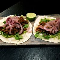 Veggie Tacos!  So good!  Remember to ask them to leave off the feta & sour cream for a vegan option.  I usually bring my own Earth Island cheddar shreds to top mine. at Fiddle And Firkin in Cambridge