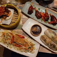 NOT Chicken Steamed Bao Bun, NOT Hot Sweetie Wings, Goi Mango Salad, and Tofu & Mushroom Summer Rolls. at Vietnamese Street Kitchen in Birmingham