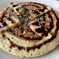 Vegan pancakes with banana  at Villa Potenciana Restaurant in Malapascua Island