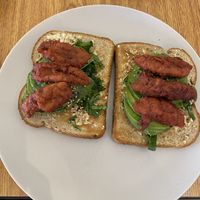 Avocado toast with vegan BBQ pork   at Alina Cafe and Eatery in Maple Ridge