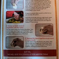 Instructions in the menu on how to eat Ethiopian food. at Lalibela Restaurant - Kreuzberg in Berlin