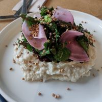 Daily special with pickled and fresh greens on a bean dip. at Wild Horses in Copenhagen