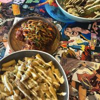 Cauliflower wings with Korean sauce baked potatoe fries with vegan sauces   at Street Dogs Street Kitchen in Portadown