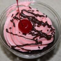 Chocolate cupcake with cherry icing. at Capital City Bakery in Austin