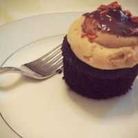 A peanut butter crunch cupcake. Right before I devoured it. at Capital City Bakery in Austin