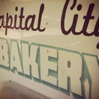 Sign on the food truck. at Capital City Bakery in Austin