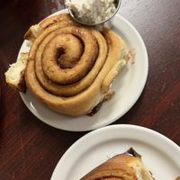 Cinnamon buns with icing  at The Hungry Pug Cafe in Kenora