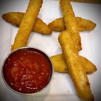 Mozzarella sticks with a delicious marinara sauce  at Real Food Daily - Pasadena in Pasadena