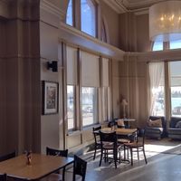 Seating area with views of Mississippi at Big Cat's Café in Muscatine