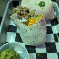 Vegan burrito. Sorry it took a bite. 😅 at The Tavern Bar & Grill in Orlando