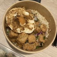 Spicy chicken rice with added fried egg  at KHUN VEGAN in Khon Kaen