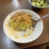 layers of tumeric & corn sticky ricee  at Hanoi Vegan Food Tours in Hanoi