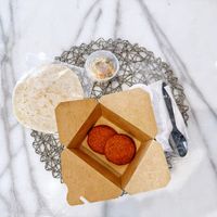 Quinoa fritters with hummus  at Cleanse & Glow in Riyadh