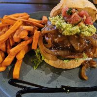 Mexican Vegan burger with sweet potato fries at Nineteen 89 Plett in Plettenberg Bay