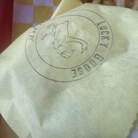 Packaging on the Burger it came in, a goose with a cleaver…. clever  at Lucky Goose  in Albuquerque