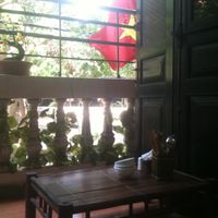 Second floor has a nice balcony, green, and still quiet because the restaurant is located in an alley. at An Phuc in Hanoi