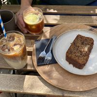 Iced latte with oat milk, espresso tonic, vegan banana bread  at Hana Corner Cafe in Tirana