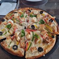 Vegan pizza at The Tattoo Cafe and Lounge in Jaipur