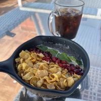 Smoothie bowl and iced americano  at The Tattoo Cafe and Lounge in Jaipur